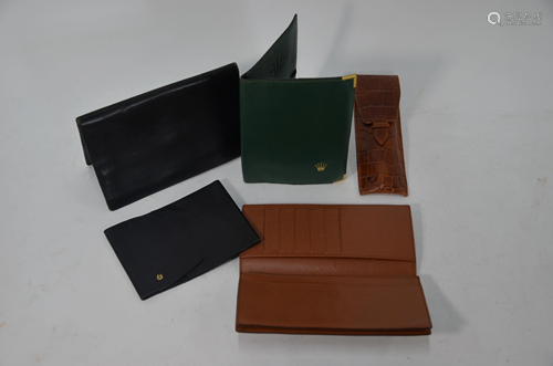 Five vintage designer wallets