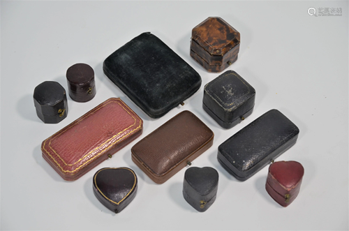 A collection of various empty antique ring and other