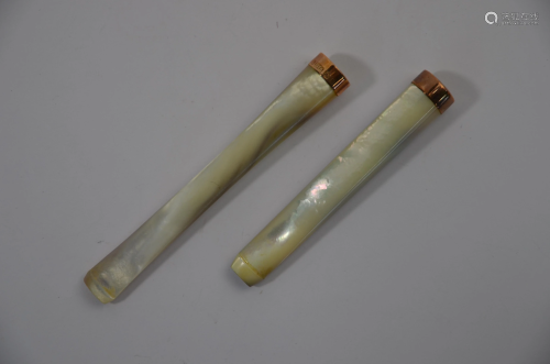 Two mother-of-pearl and 9ct rose gold cheroot holders