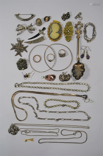 A collection of silver and white metal jewellery