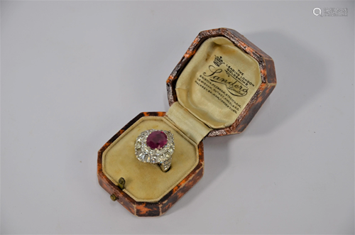 A ruby and diamond cluster ring