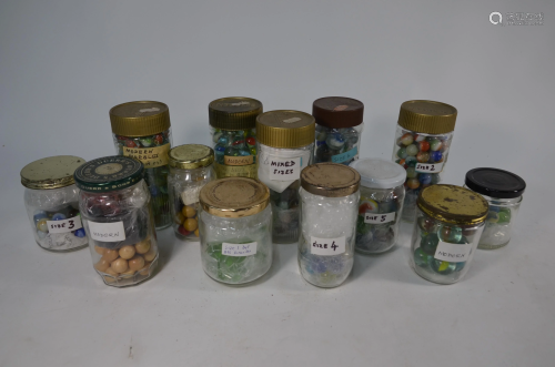 Thirteen jars of antique and later glass and ceramic