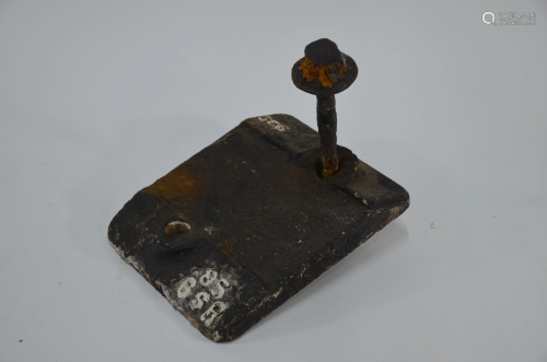 A vintage cast iron GSR track tie and securing pin,
