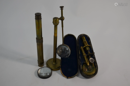 A 19th century cased brass pocket microscope