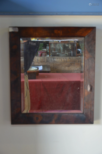 An antique oyster veneered bevel edged mirror …