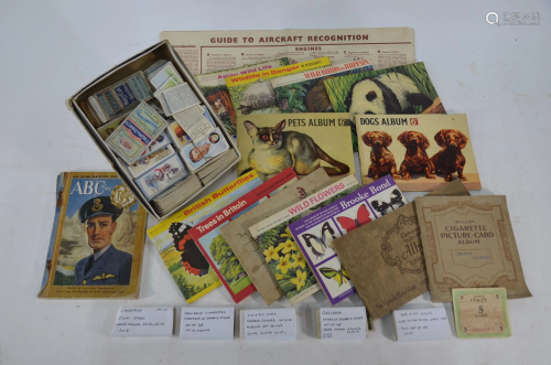 A quantity of cigarette cards and other trade cards