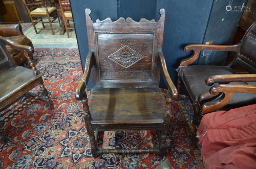 A 17th century and later oak wainscot armchair
