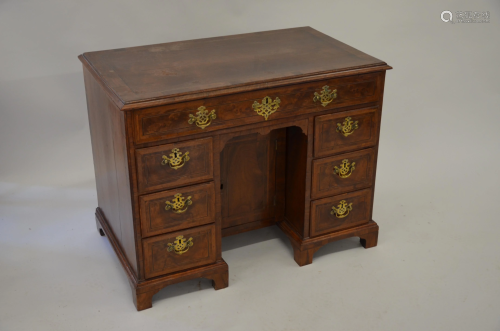 An 18th century feather-banded walnut and fruitwood