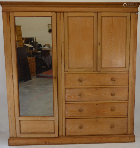 A limed oak mirrored compactum in the manner of…