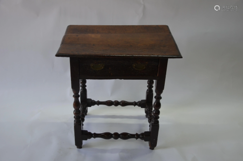 A 17th/18th century oak side table