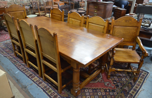 An oak refectory table and chairs