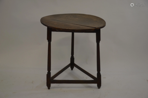 An 18th century oak cricket table