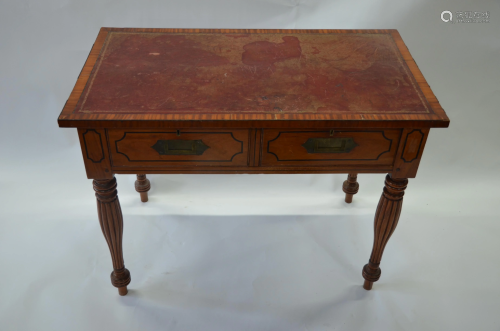 A Sheraton style ebony-strung inlay satinwood desk,