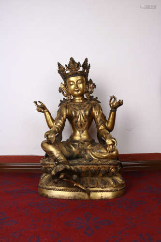 A Gilt Bronze Guanyin Statue With Four Arms