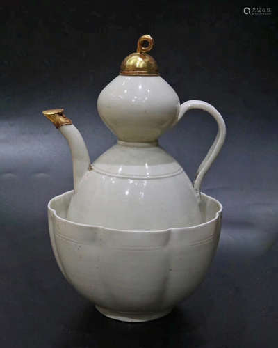 A SONG DYNASTY DING KILN GOURD WARPPED WITH GOLD POT