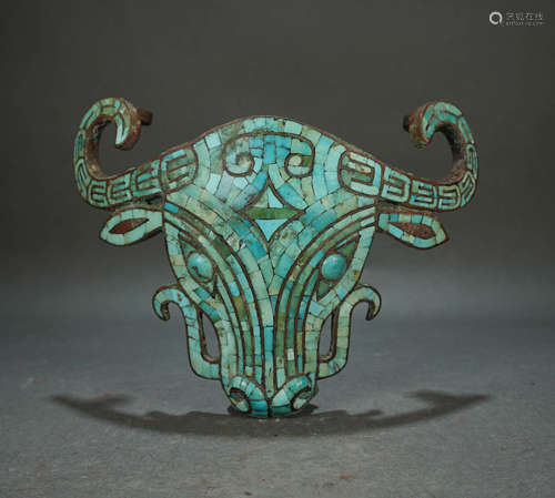 A WARRING STATES PERIOD BRONZE OX ORNAMENT