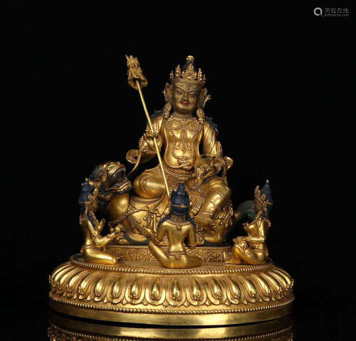 A MING YONGLE DYNASTY BRONZE GILDED STATUE OF THE KING OF HEAVEN