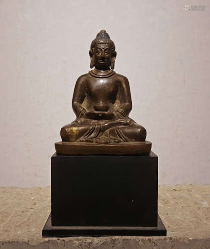 A YUAN DYNASTY COPPER MEDICINE MASTER BUDDHA