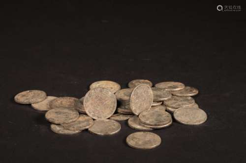 A GROUP OF 34 QING DYNASTY XUANTONG GUANGXU MACHINE-MADE COINS