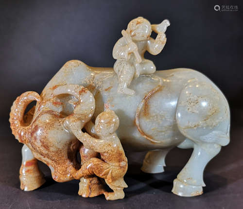 A QING DYNASTY WHITE JADE CATTLE  ORNAMENT