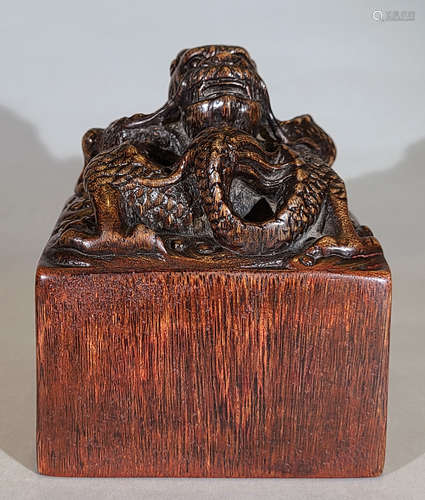 A QING DYNASTY AGARWOOD DRAGON BUTTON SEAL