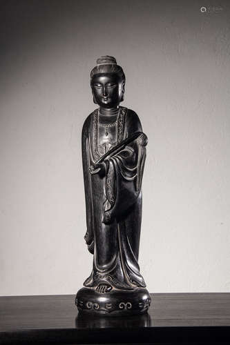 A Chinese Hardwood Carved Guanyin Figurine