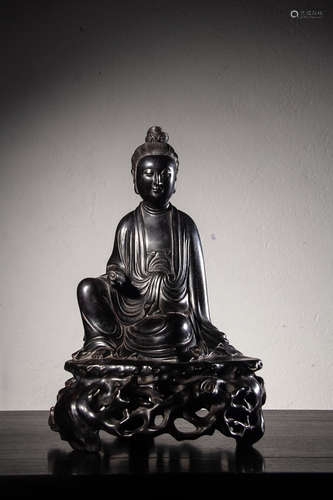 A Chinese Hardwood Carved Guanyin Figurine