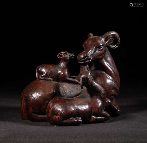 A Chinese Hardwood Carved Ram