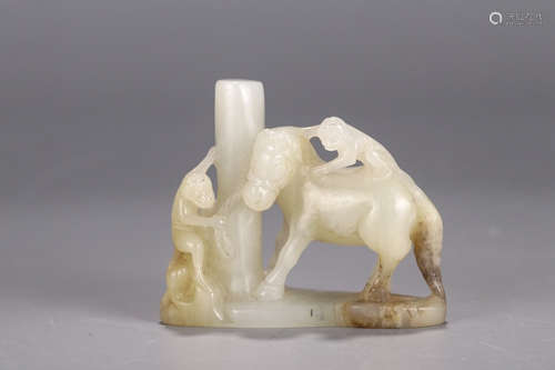 A Chinese White Jade Carved Monkey On Horseback