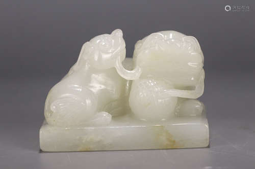 A Chinese White Jade Carved Foolions