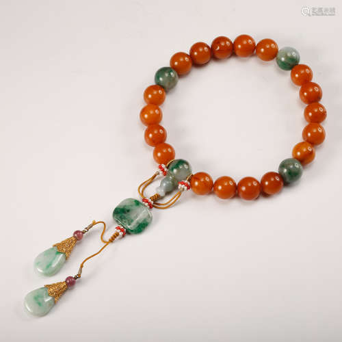 A Chinese Amber And Jadeite Beads Bracelet