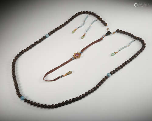 A Chinese Chenxiang Wood Court Beads Necklace
