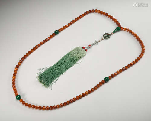 A Chinese Amber Qing Court Beads Necklace
