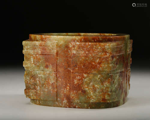 A Chinese Celadon Jade Cong