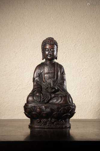 A Chinese Hardwood Carved Buddha