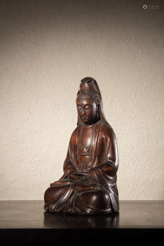 A Chinese Hardwood Carved Seated Guanyin