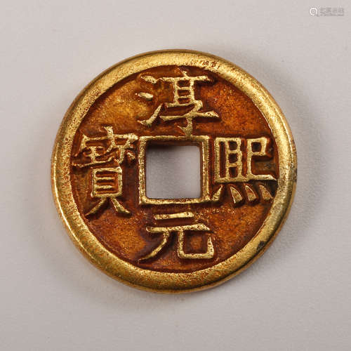 A Chinese Gilt Bronze Coin