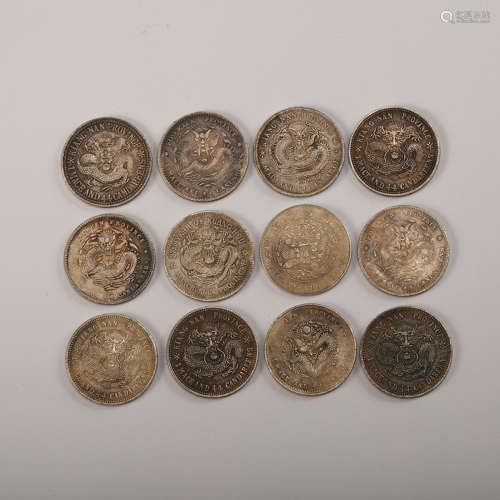 A Chinese Set Of 12 Silver Coins