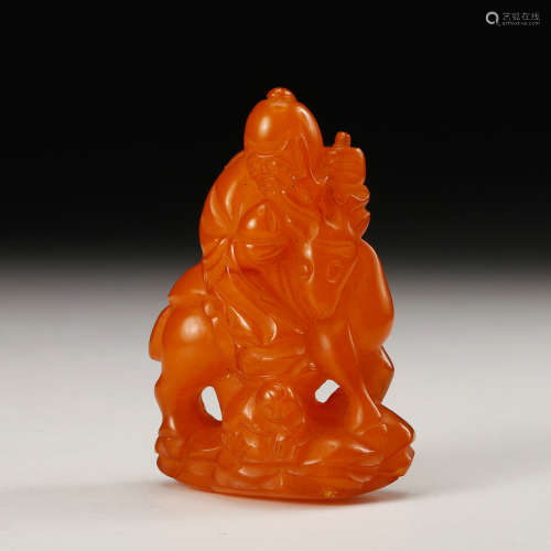 A Chinese Amber Carved Figurine