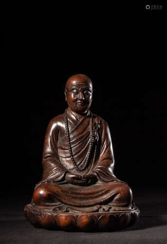 A Chinese Bamboo Carved Seated Buddha