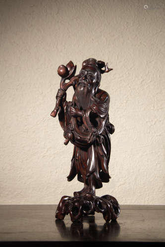 A Chinese Huangyang Wood Carved Figurine