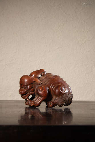 A Chinese Huangyang Wood Carved Beast