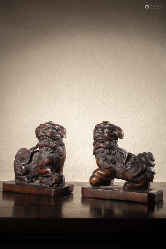 A Chinese Hardwood Carved Foolions, Pair