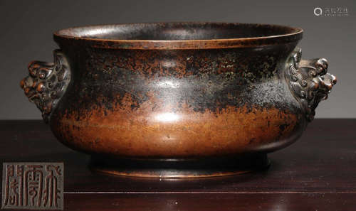 A COPPER CENSER WITH BEAST EARS