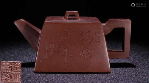 A ZISHA TEA POT CARVED WITH LANDSCAPE