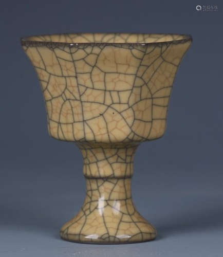 A BROWN GLAZE CUP