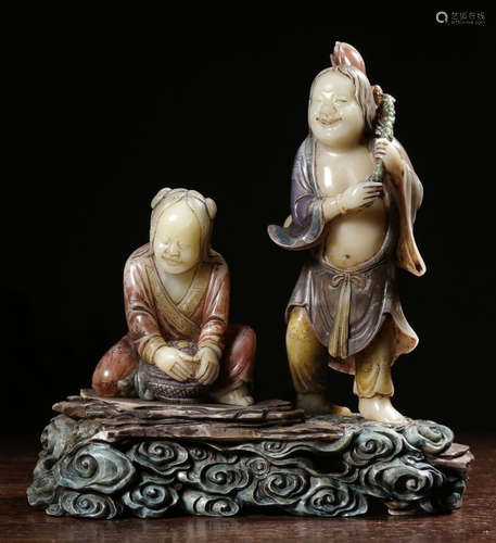 A SHOUSHAN STONE FIGURE STATUE