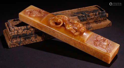 A TIANHUANG STAONE PAPERWEIGHT CARVED WITH BEAST