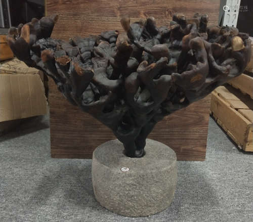 A WOOD ORNAMENT SHAPED WITH GANODERMA