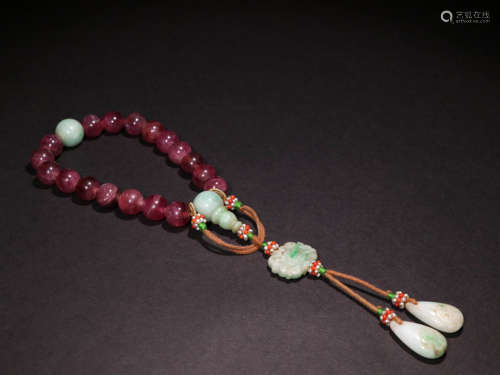 A CHINESE ANTIQUE TOURMALINE HAND CHAIN